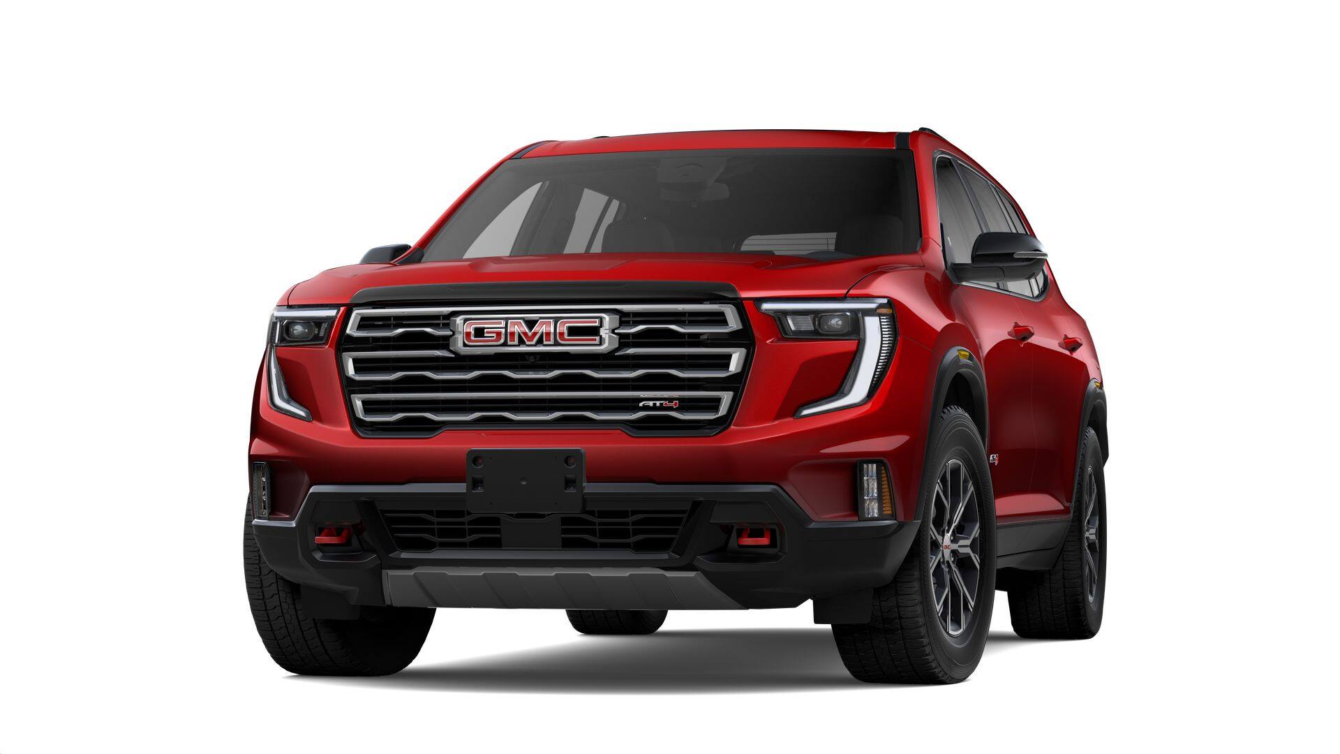 2026 GMC Acadia AT4 in Volcanic Red Tintcoat — front three-quarter view