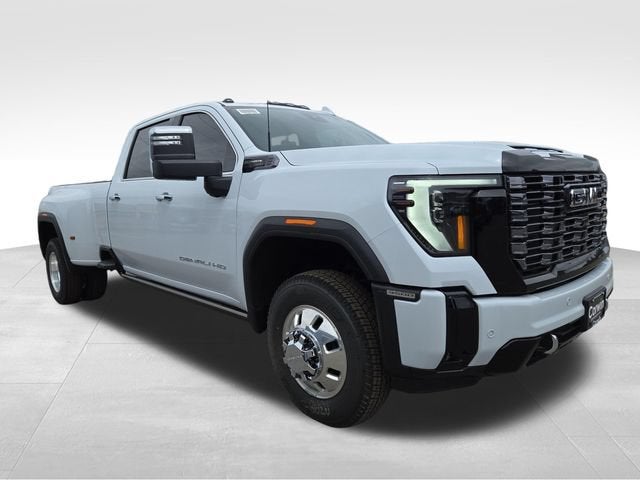 2026 GMC Sierra 3500 HD Denali Ultimate DRW in Glacier White Tricoat — front three-quarter view
