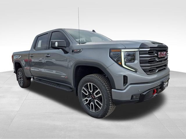 2026 GMC Sierra 1500 AT4 in Sterling Metallic — front three-quarter view