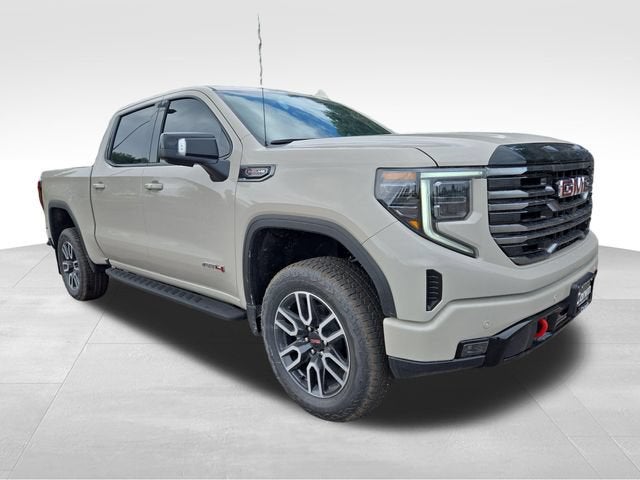 2026 GMC Sierra 1500 AT4 in Coastal Dune — front three-quarter view