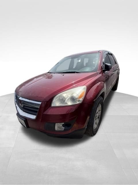 2007 Saturn Outlook XE in Red Jewel Tintcoat — front three-quarter view