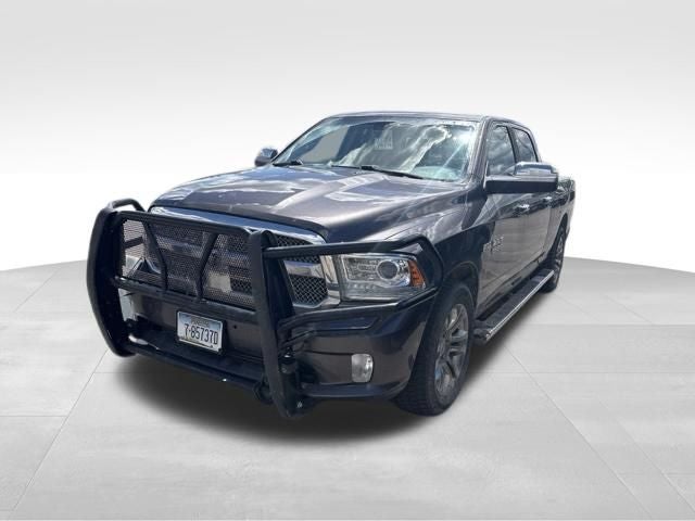 2014 RAM 1500 Laramie Longhorn in Granite Crystal Metallic Clearcoat — front three-quarter view