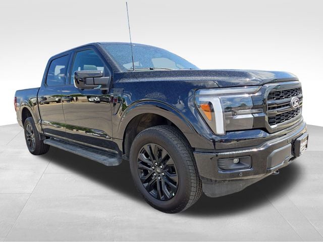 2025 Ford F-150 Lariat in Agate Black Metallic — front three-quarter view